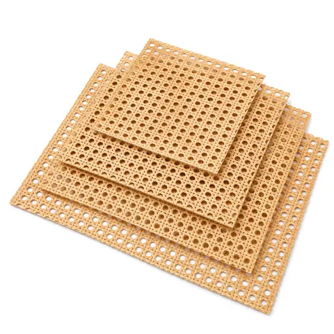 Offset stack of four open weave cane webbing sheets in graduated sizes, smallest on top, on a white background