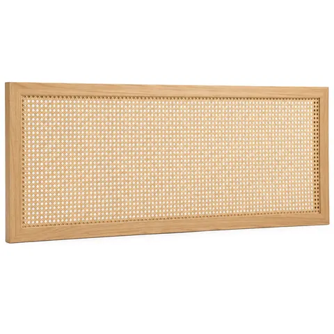 Wide, low light oak frame with an open weave cane panel, leaning on the floor on a white background
