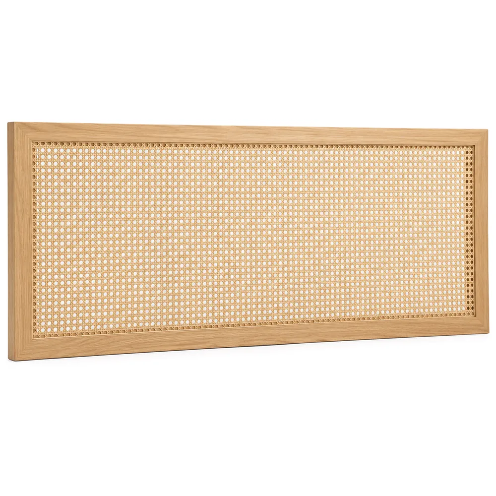 Wide, low light oak frame with an open weave cane panel, leaning on the floor on a white background