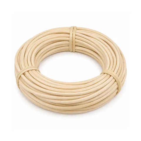Coil of thick, smooth, matte pale cream round rattan core, tied, on a white background