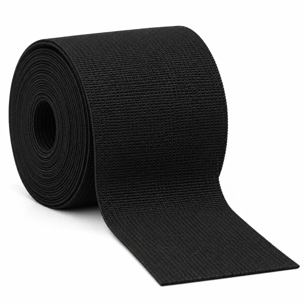 Roll of black 2 in elastic chair webbing with the loose end unrolled toward the camera, on a white background