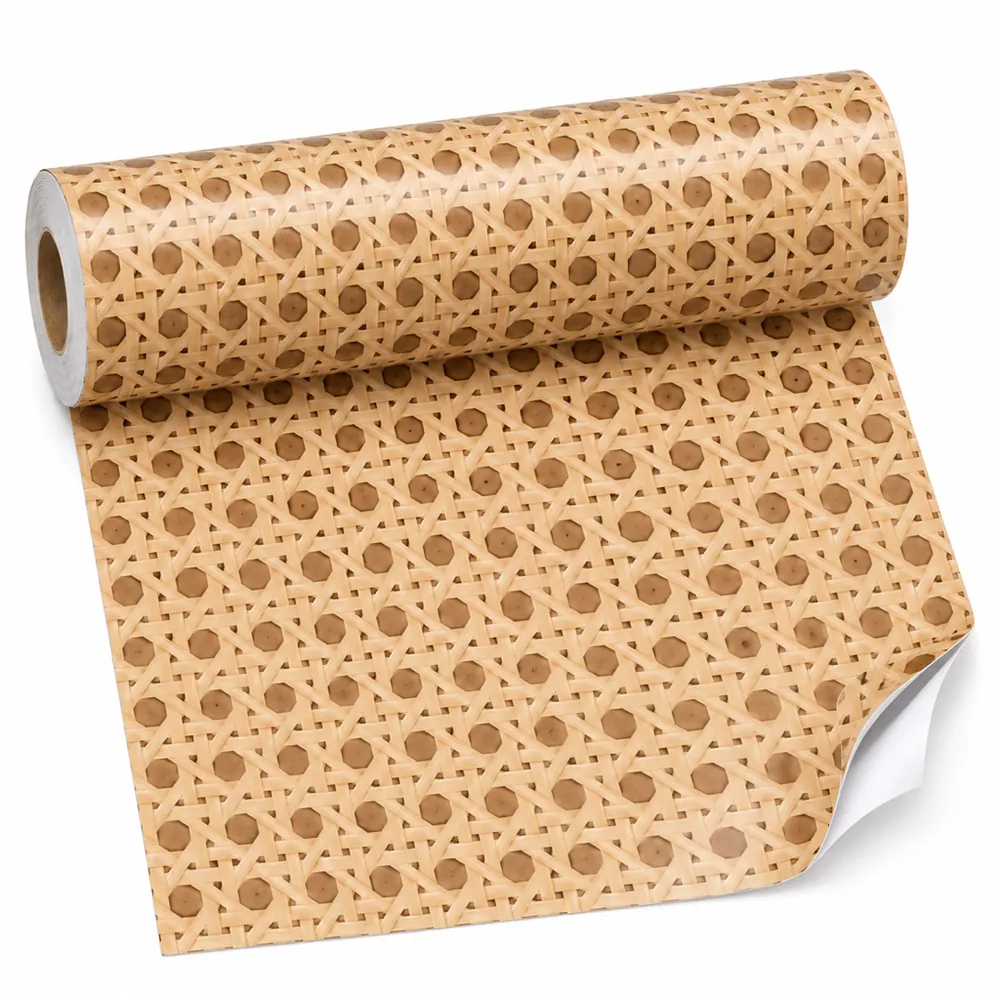 Roll of beige cane-pattern contact paper partly unrolled on a white background, backing peeled at one corner