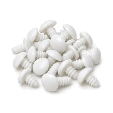 Small pile of white plastic patio strap rivets with mushroom heads and ribbed shanks on a white background