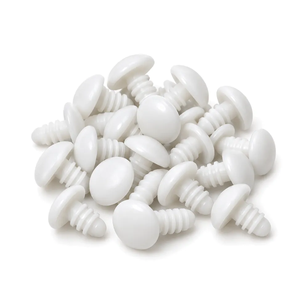 Small pile of white plastic patio strap rivets with mushroom heads and ribbed shanks on a white background